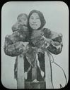 Image of Eskimo [Inuk] Woman with Baby in Hood, Baffin Land